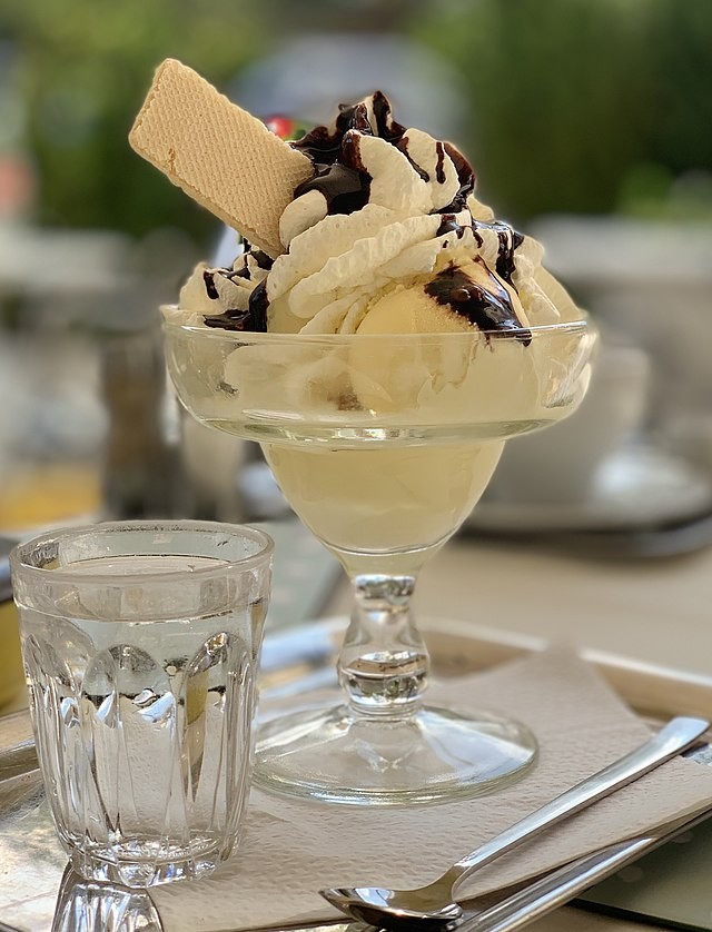 ice-cream-with-whipped-cream-chocolate-syrup-and-a-wafer-cropped-1686731962.jpg