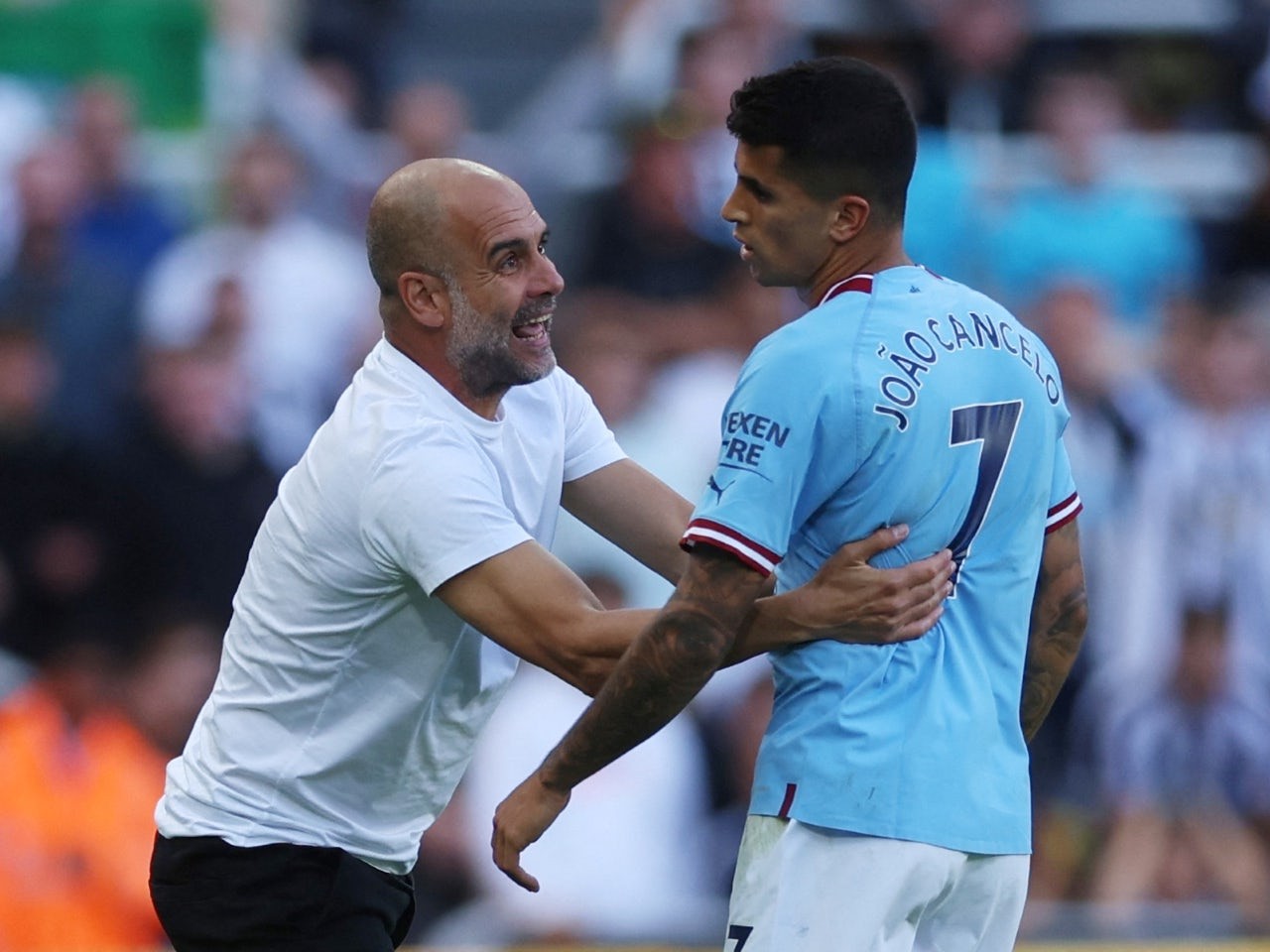 pep-guardiola-joao-cancelo-1690770097.jpg