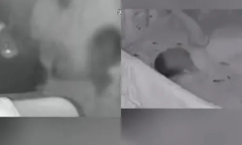 Clip: Bảo mẫu bị ghi hình túm cổ, nhấc trẻ sơ sinh khỏi nôi