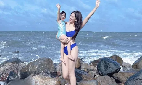 Hiếm hoi lắm mới thấy Thiên An khoe body mướt mắt cùng con gái trên biển
